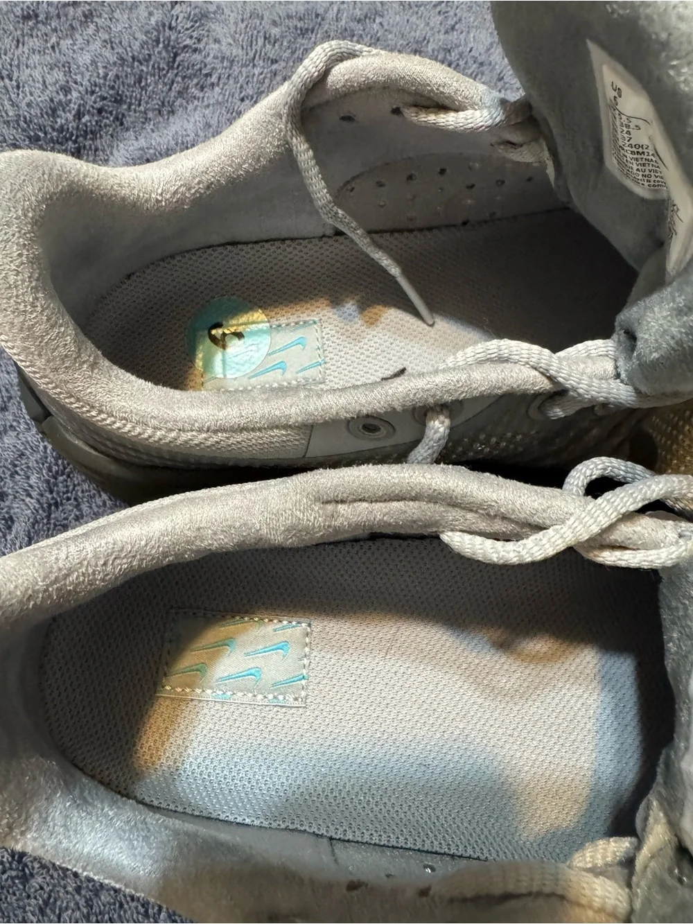 Nike Gray Shoe Size Label with Black Swoosh